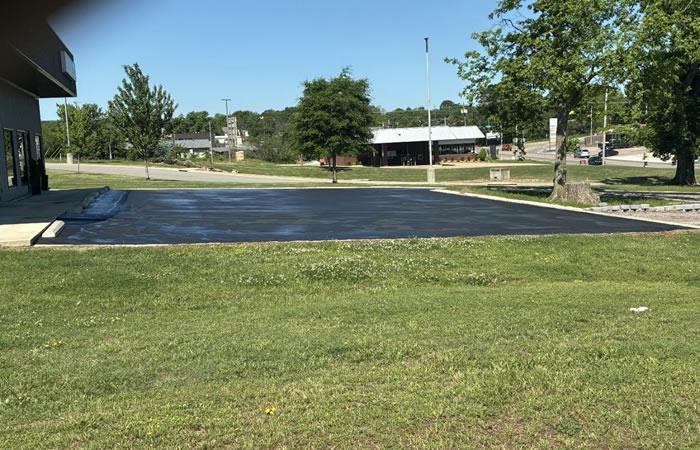 From Backroads to Blacktops: Hillbilly Realty & All American Asphalt Paving in Ozark, Arkansas